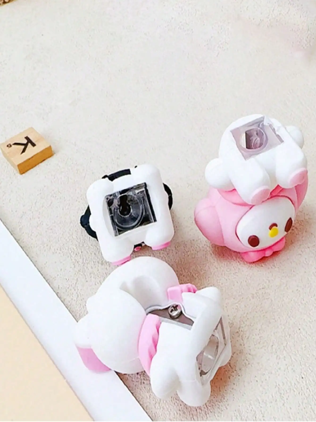 1 قطعة قلم وممحاة اثنين في واحد كورومي ميلودي مبراة أقلام رصاص مزدوجة الأغراض، ممحاة، مسوي أقلام، ومبراة أقلام للعودة إلى