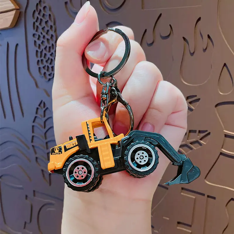 Creative Mini Alloy Engineering Inertia รถของเล่นพวงกุญแจจี้การ์ตูนที่สมจริง City Excavator Bulldozer ดึงกลับรถของเล่น