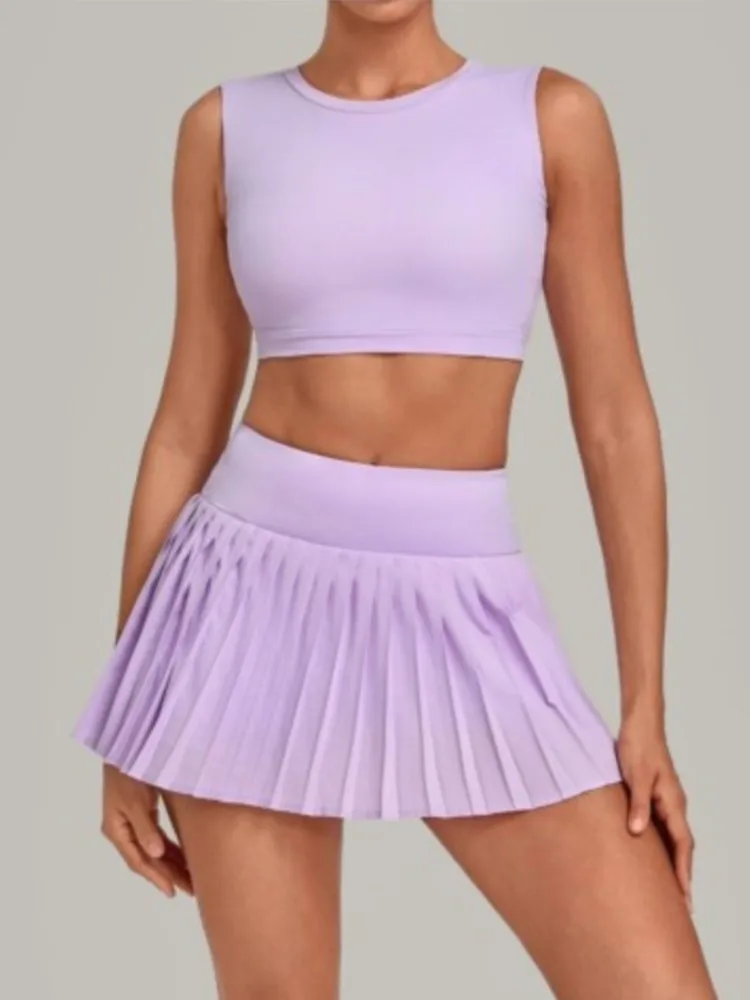 Ensemble de sport pour femmes en 2 pièces, comprenant un short et une jupe à séchage rapide, un haut à manches longues et col rond, idéal pour la course, le fitness, l'entraînement et les activités sportives.