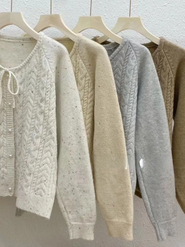 Jesienne nowe sweter Vintage dzianinowe płaszcze z dekoltem w szpic jednorzędowe sznurowane swetry w kropki styl Preppy wszystkie ubrania damskie