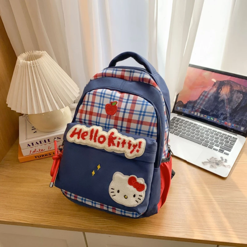 

Sanrio backpack new retro checkered female college student niche cute cartoon kitten large capacity lightweight backpack