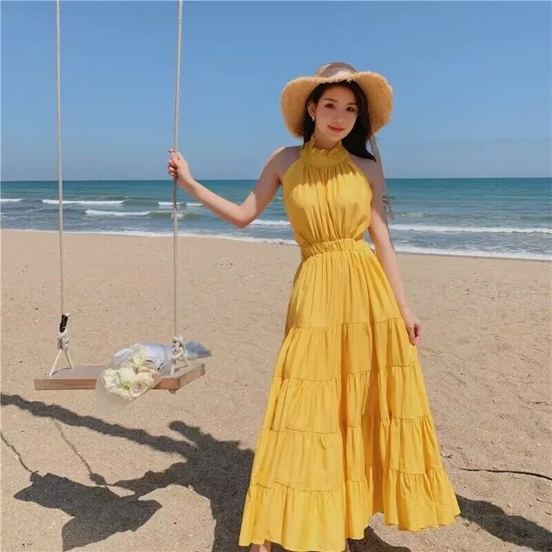2024 novo verão feminino praia férias estilo temperamento francês suave pendurado pescoço aberto para trás fora do ombro vestido longo amarelo