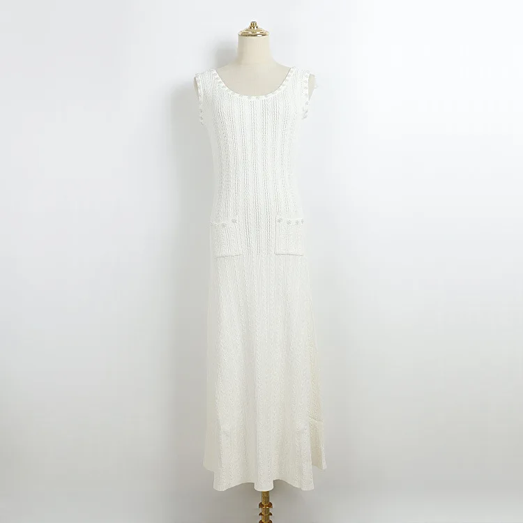 Dames gele kabelgebreide mouwloze maxi-jurk O-hals parelversiering wijde zoom Franse jurken zoete stijl casual gebreide jurk