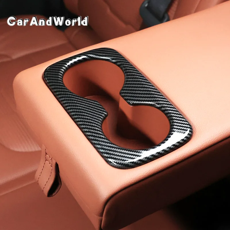 ABS Carbon Fiber For Sportage NQ5 2022-2026 Rear Armrest Water Cup Holder Frame Cover Protective Trims Stickers Car Accessories
