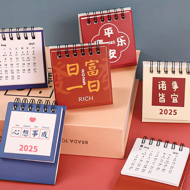 2025มินิแคตตันกระเป๋าปฏิทินตั้งโต๊ะขนาดเล็กแบบพกพาปฏิทินแบบเจาะแผนตกแต่ง