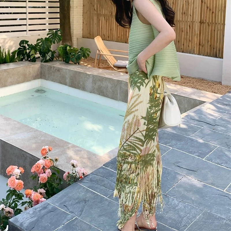 Sleeveless two-piece women's summer irregular round neck pleated loose sleeveless vest+high waist pleated tassel skirt suit