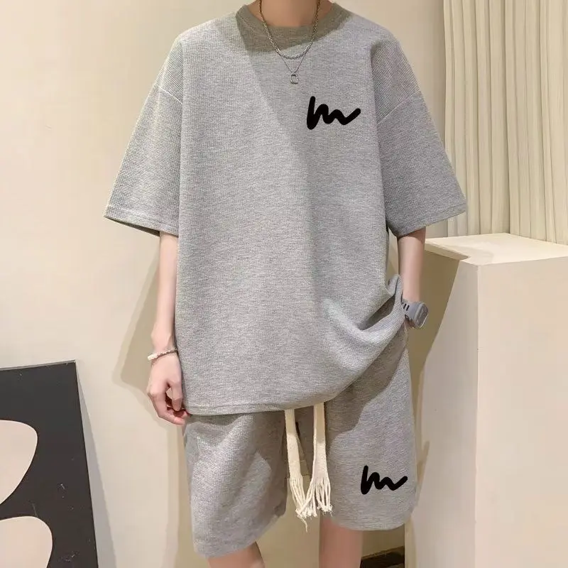 

Casual Hong Kong Style Suit, A Set of Summer Short-sleeved Trendy Men's Clothing, and A Handsome Trendy Sports Suit for Men.
