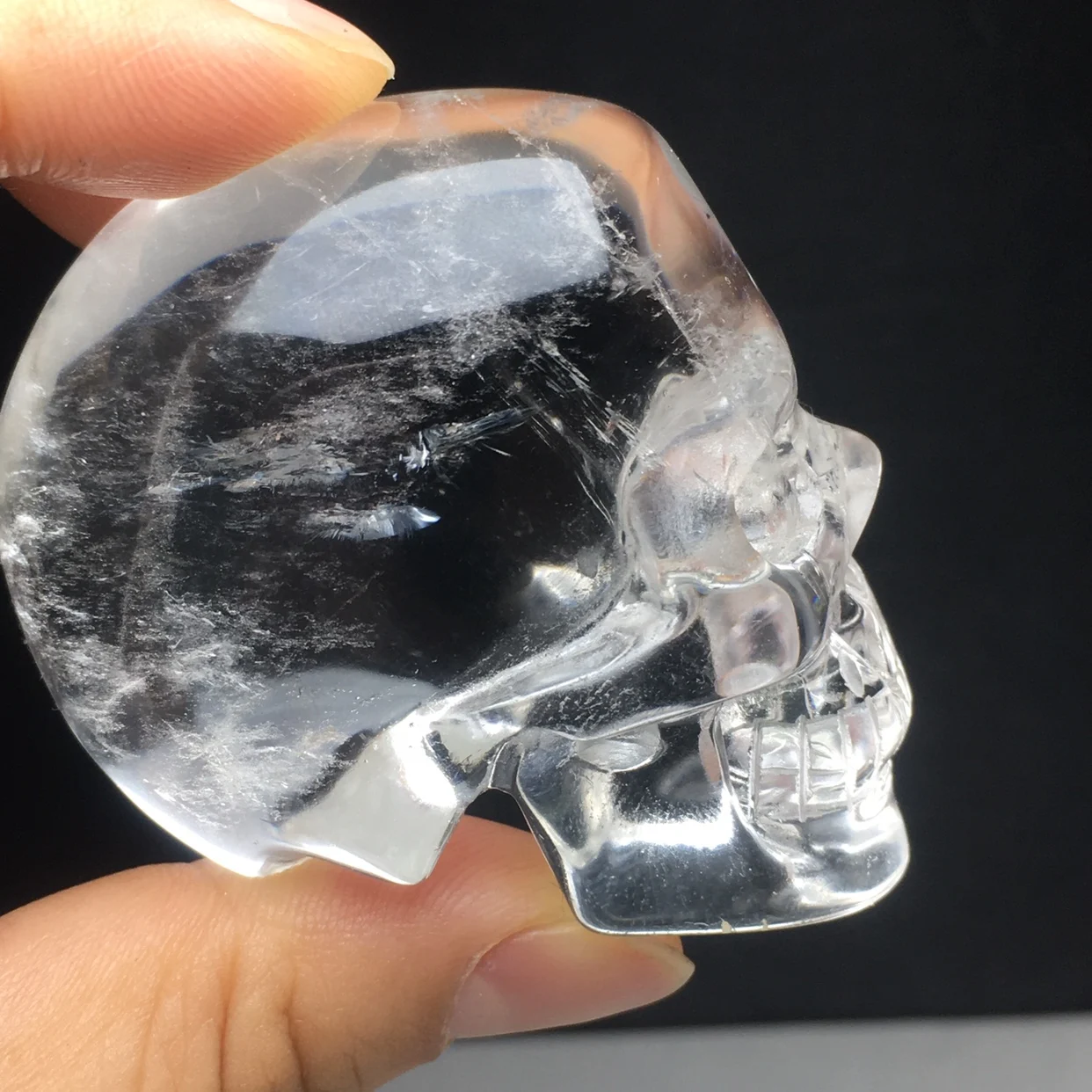 

80-90g Natural white crystal skull stone carving handicraft ornaments