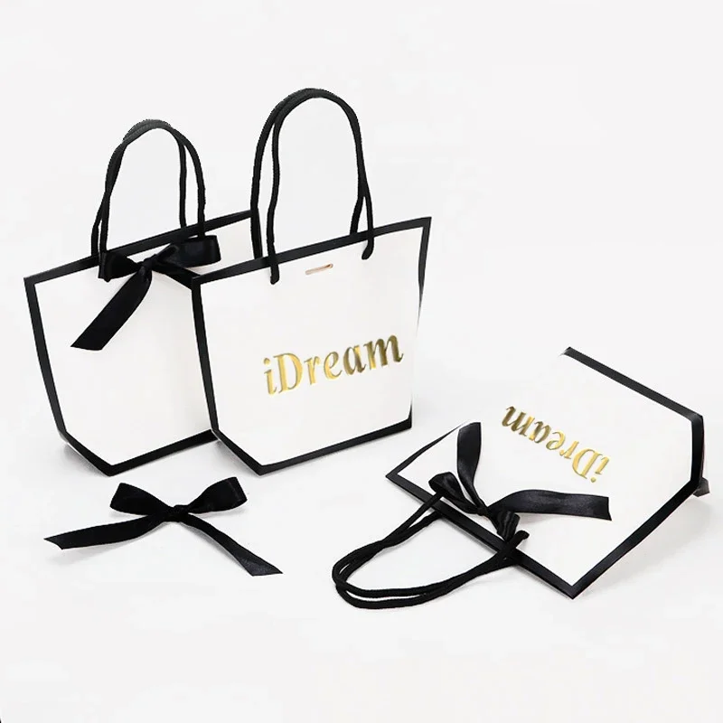 Factory direct pricing Custom Logo Boutique Shopping White Beauty Clothing Branded Paper Retail Bag  Rigorous quality control