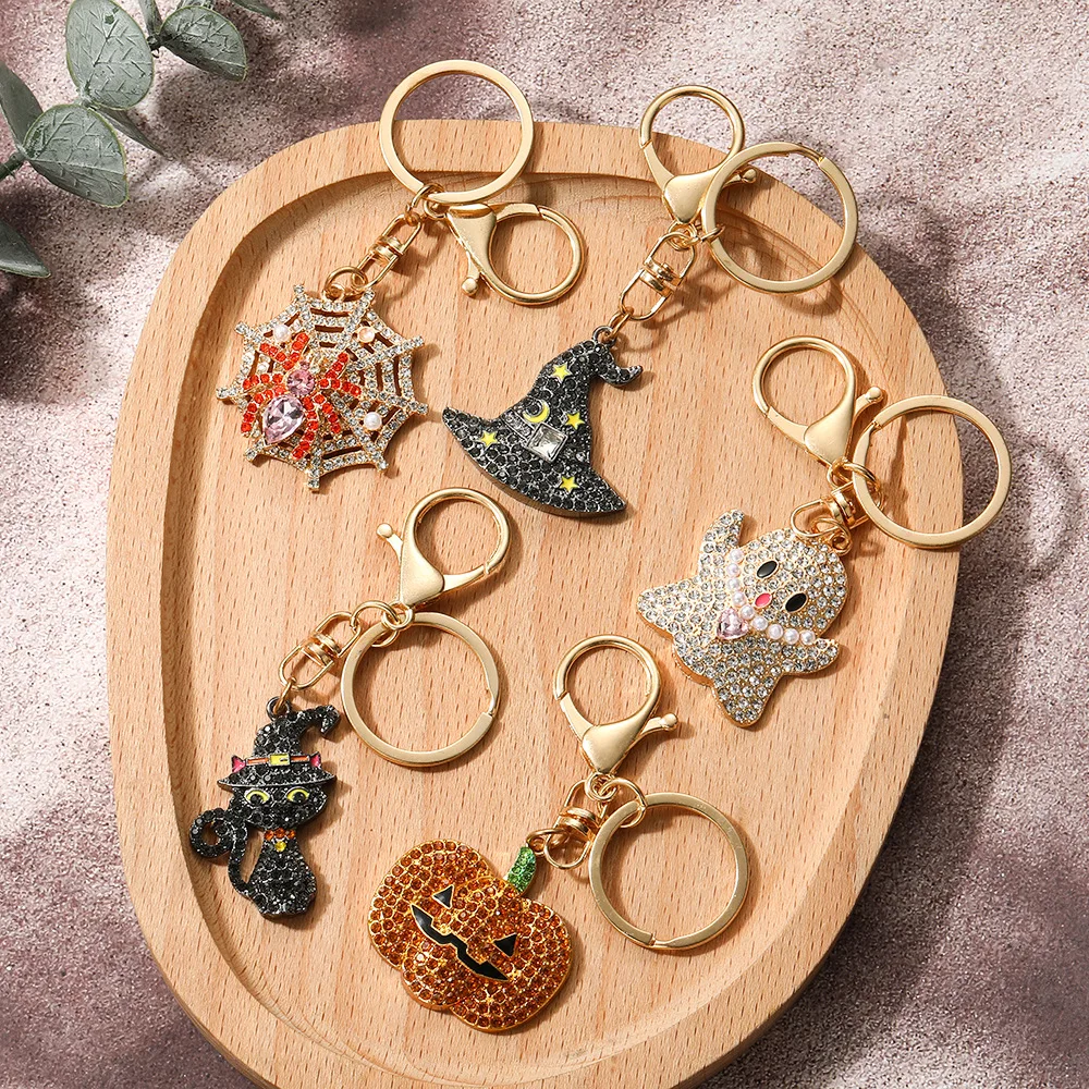 chaveiro-de-halloween-com-teia-de-aranha-colorida-abobora-esqueleto-e-chapeu-magico-com-strass-completos-e-brilho-presente-para-criancas-e-amigos