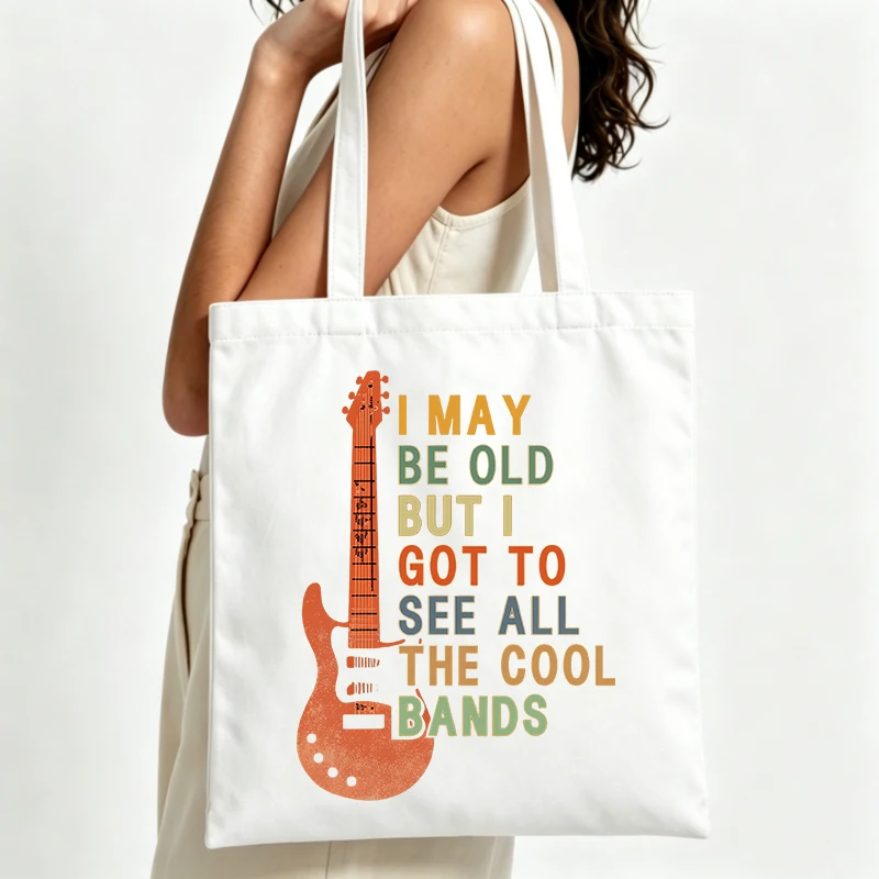 guitar graphic canvas tote bag with vintage text print, ideal for casual outings and music events