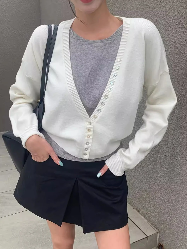 

Korean Chic Autumn New Niche Design Contrasting Color Splicing Fake Two-piece V-neck Button Knit Sweater Top for Women