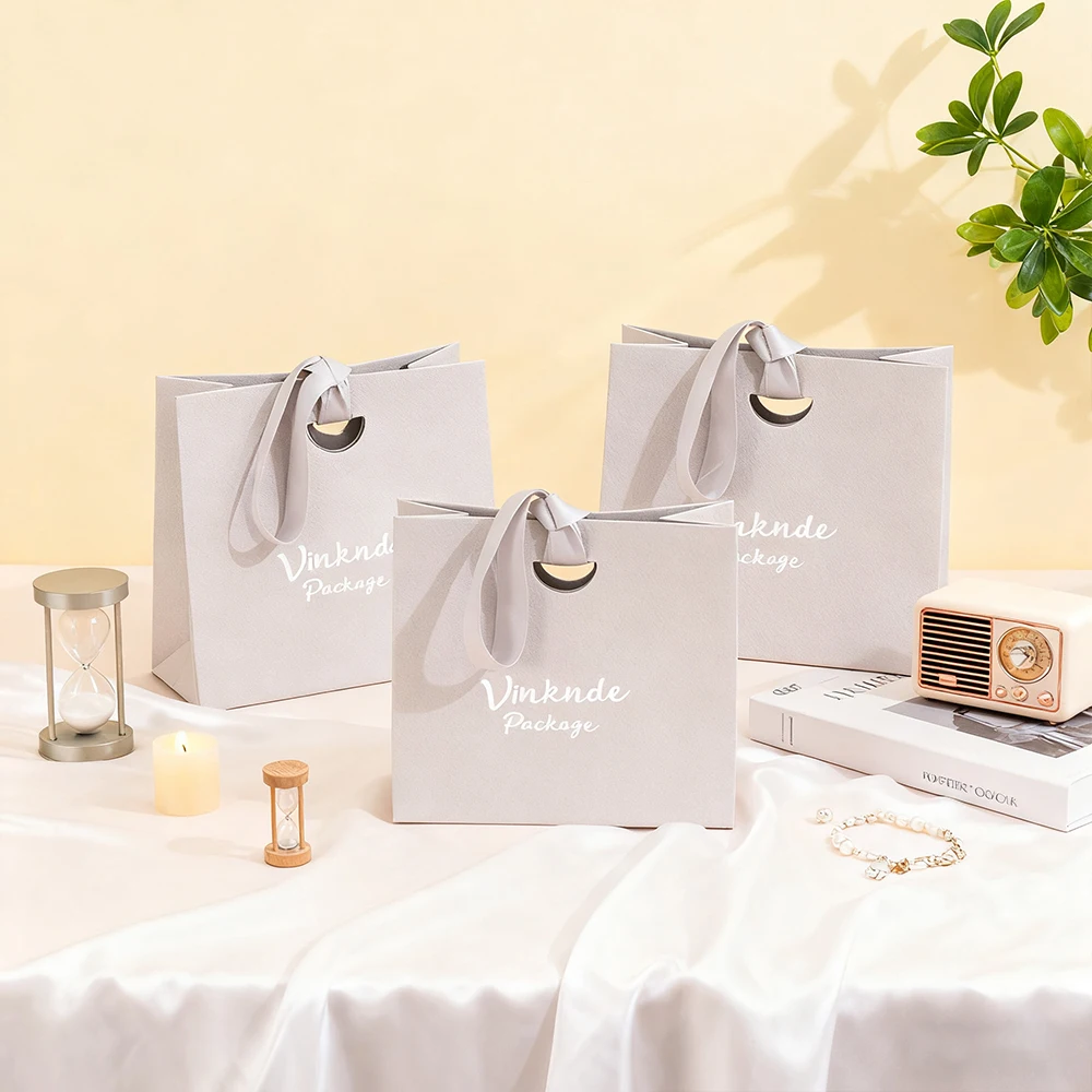 

Wholesale Lychee Pattern Kraft Paper Gift Bags with Ribbon Handles Personalized Shopping Cosmetics Jewelry Perfume Packaging Bag