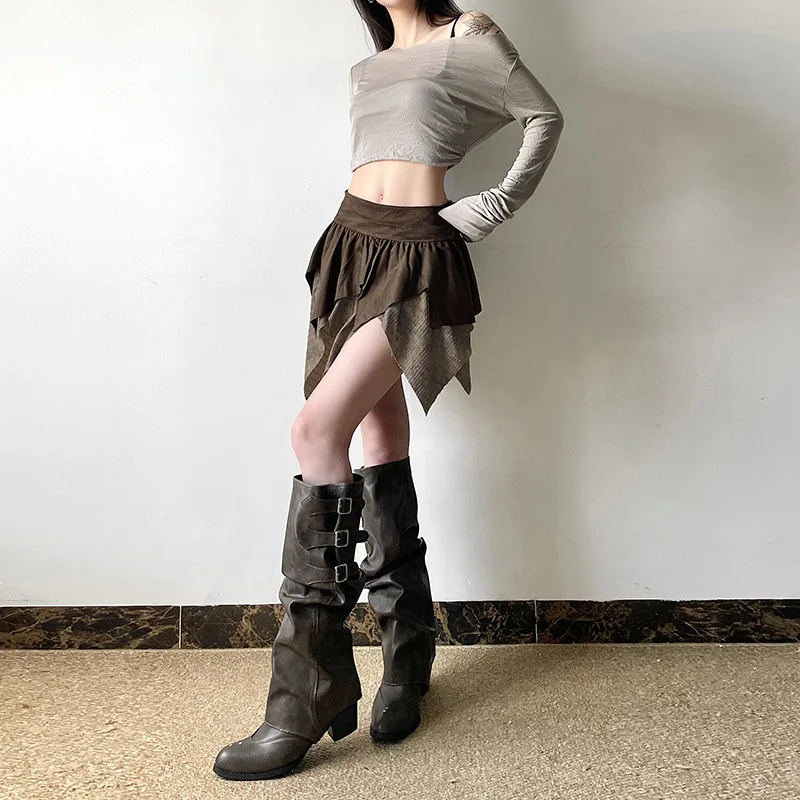 ملابس نسائية جديدة للخريف على الطراز الأوروبي الأمريكي بلون سادة تناسب أزياء الشارع تنورة غير منتظمة عالية الخصر للسيدات