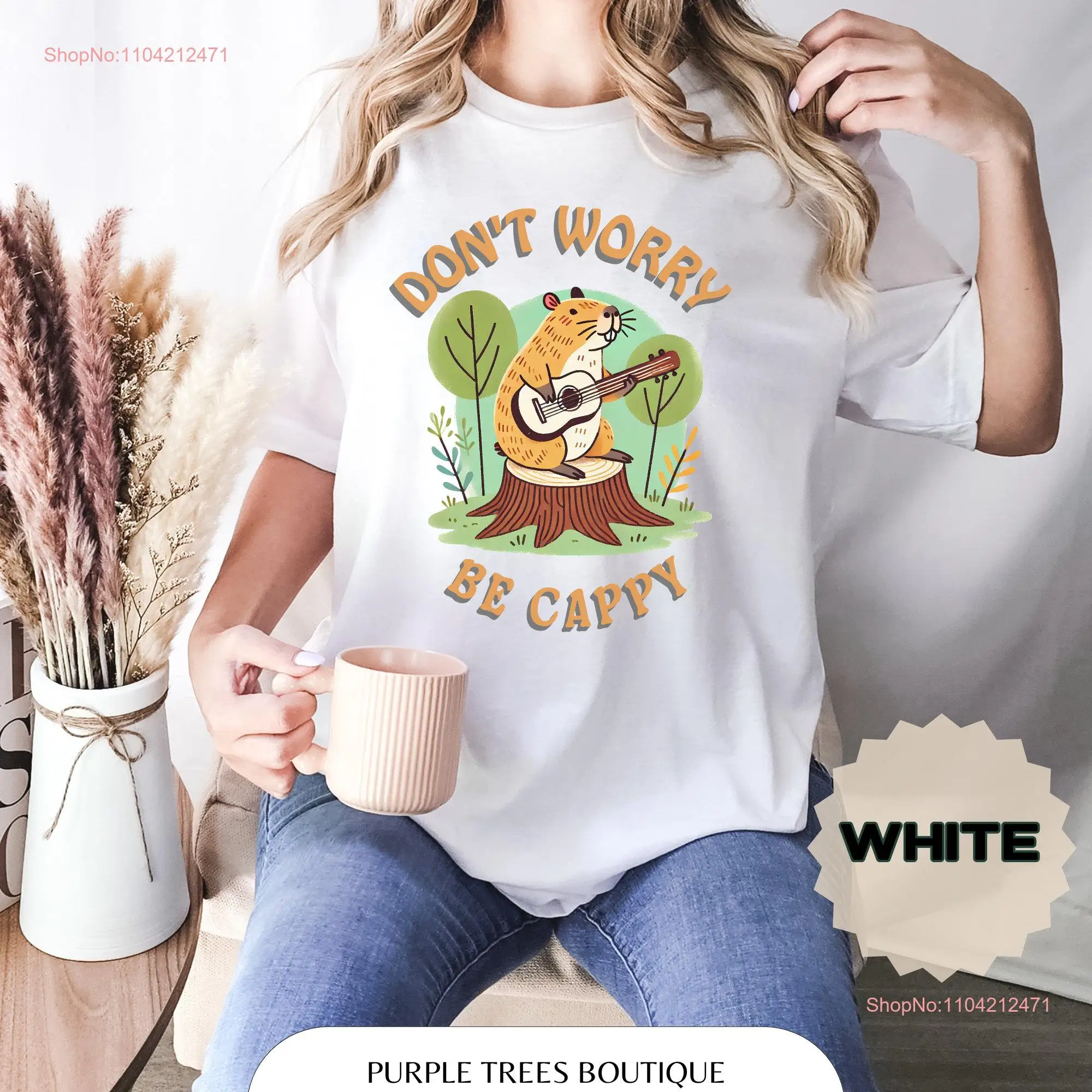 Don't Worry Be Cappy T Shirt Capybara with Ukelele Guitar Cute Sitting on a Trunk DRC 04 1 long or short sleeves