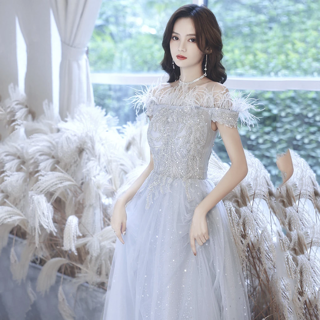 

Gorgeous Evening Dresses Off Shoulder Silver Gray Sequined Applique Feather A Line Beading Elegant Graduation Formal Party Gowns