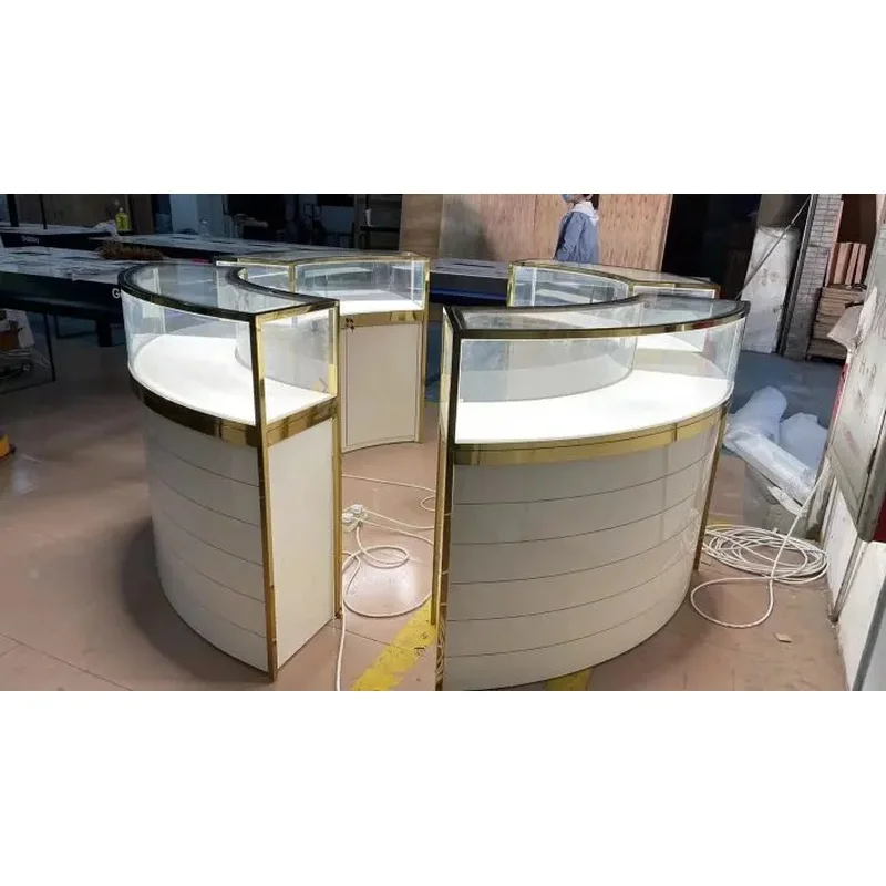 custom.Custom Full Set Luxury Jewelry Store Furniture Curved Gold Stainless Steel Frame Glass Display Cabinet LED Light Island S