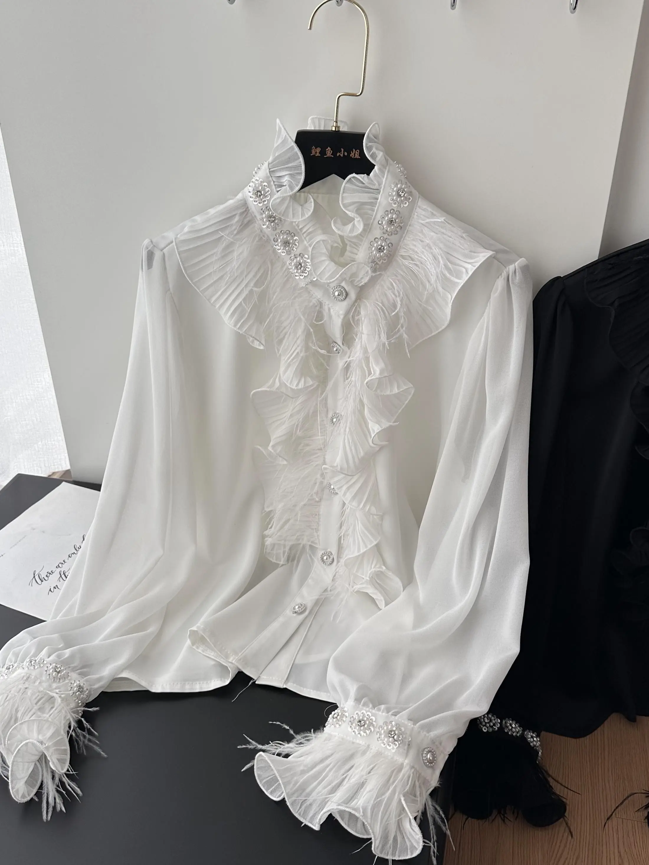 เสื้อผู้หญิงคอตั้งประดับเลื่อมและพู่ ดีไซน์เกาหลี สไตล์แฟชั่น ทรงหลวม แขนยาว ให้ความรู้สึกพรีเมียม