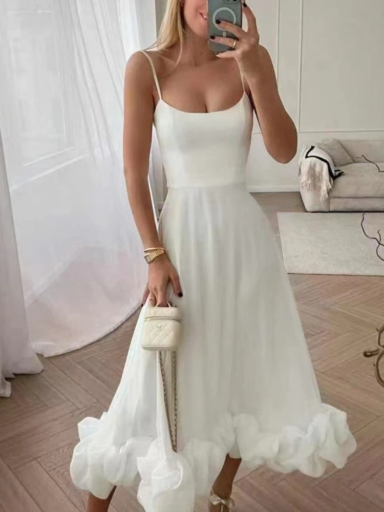 Robe longue élégante à volants unie pour femme, avec bretelles, taille ajustée, sans manches, dos nu, style soirée, plage, jupe évasée, coupe trapèze, tutu