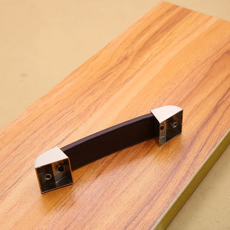 亜鉛合金手作りレザーハンドルモダンなヨーロッパスタイルのソフトシンプルなドアキャビネット引き出しキッチンキャビネットワードローブハードウェア