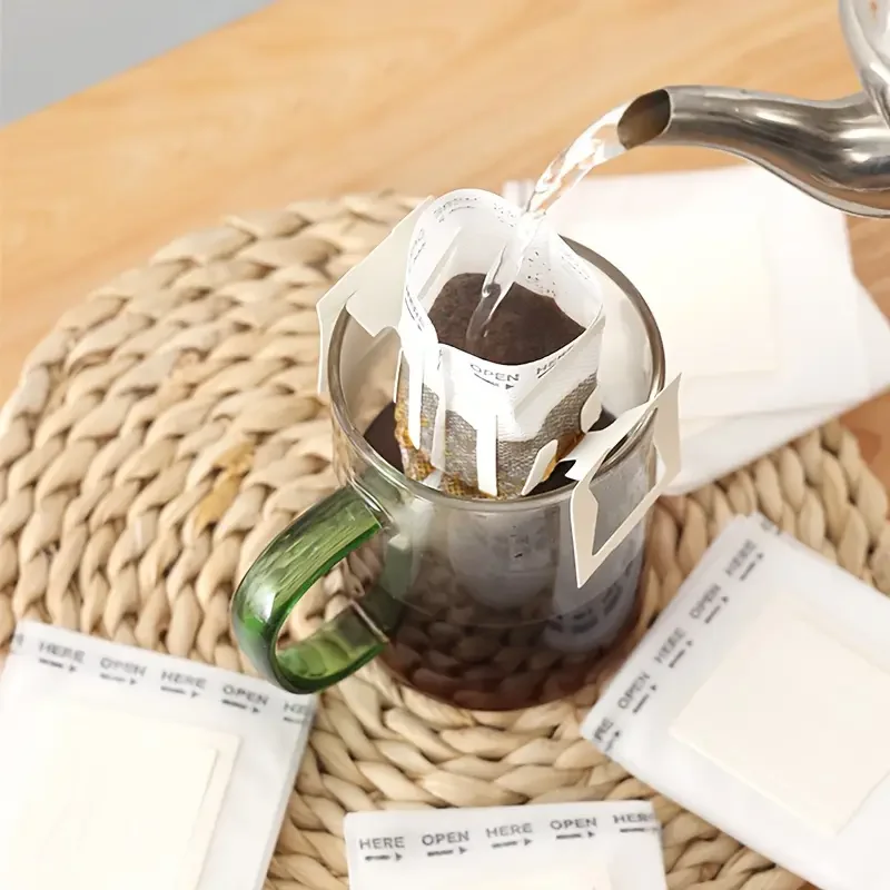 

50pcs Household Coffee Drip Filter Bag Disposable Drip Coffee Filter Bags Coffee Paper Portable Hanging Ear Espresso Coffee Tool