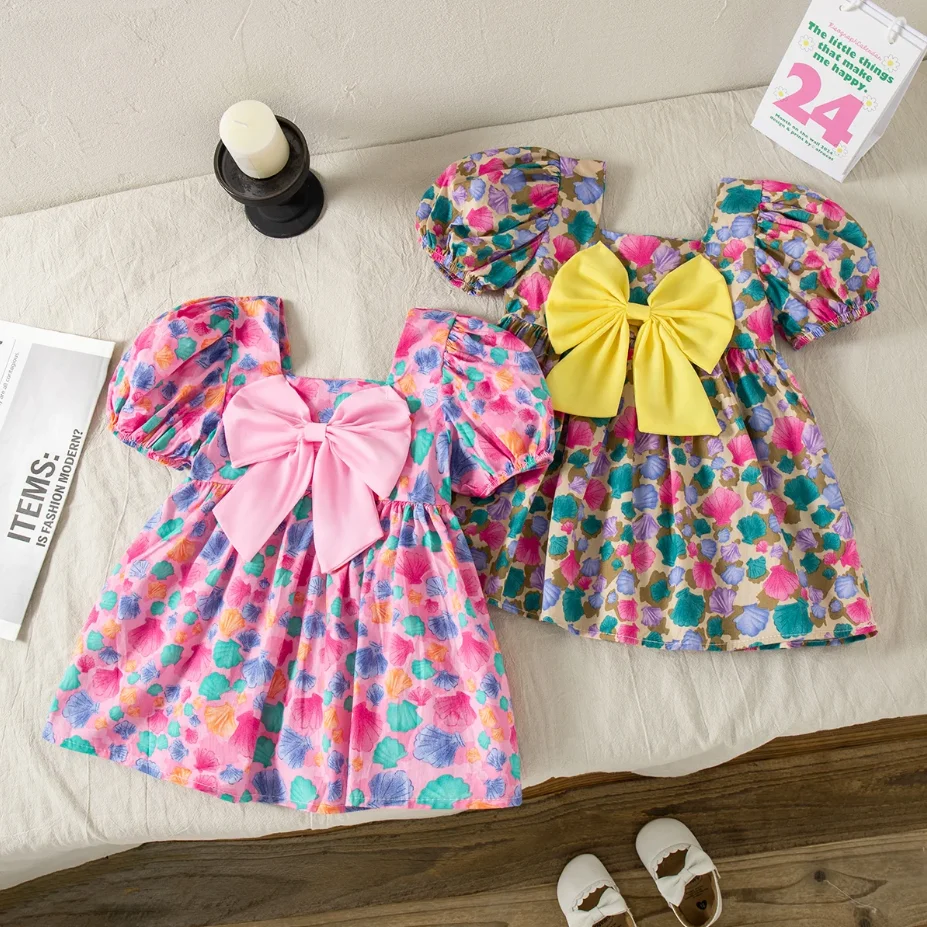 

Baby Girl Dress Summer New Sweet Shell Printed Bubble Sleeves Big Bow Cotton Cloth Skirt Suitable for Children Aged 80-110