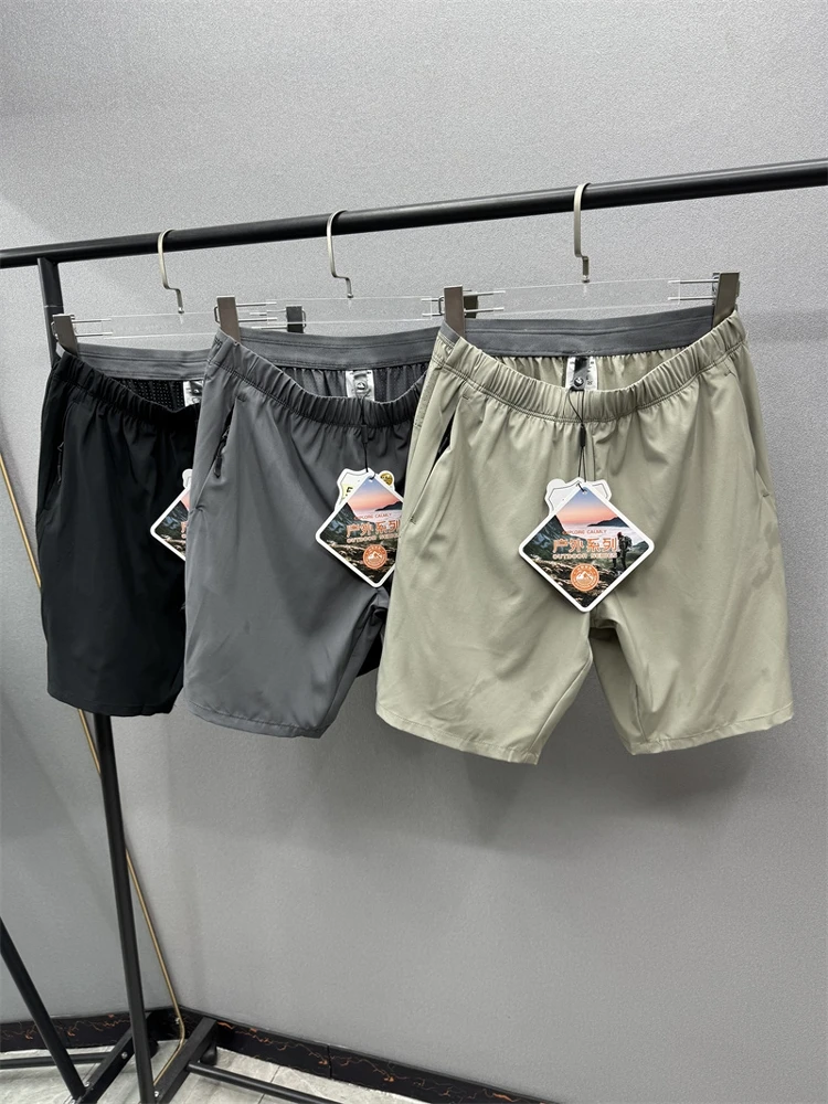 

Men's Summer Outdoor Sports Casual Qui Dry Breathable Cool Feeling Tech Fabric Laser Perforated orts Loose Fit mid Waist