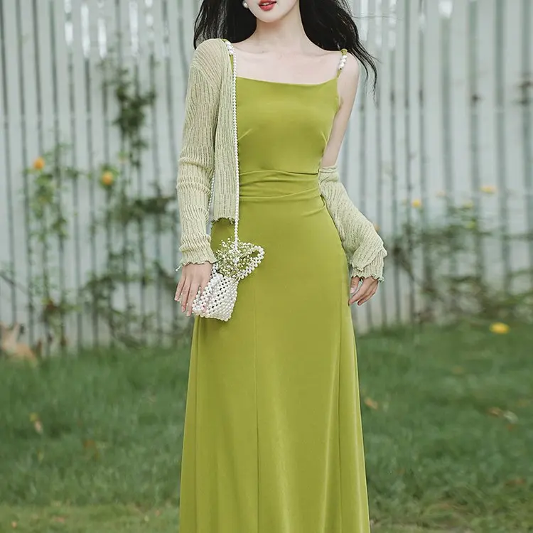 

Женский комплект из двух предметов: открытый кардиган и платье. Красивая осенняя модная новинка 2025 года.