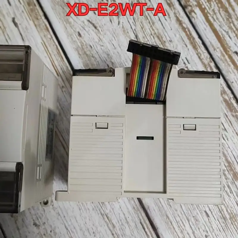 Second-hand PLC module XD-E2WT-A  function test is normal Original authentic Latest Pricing for 2026