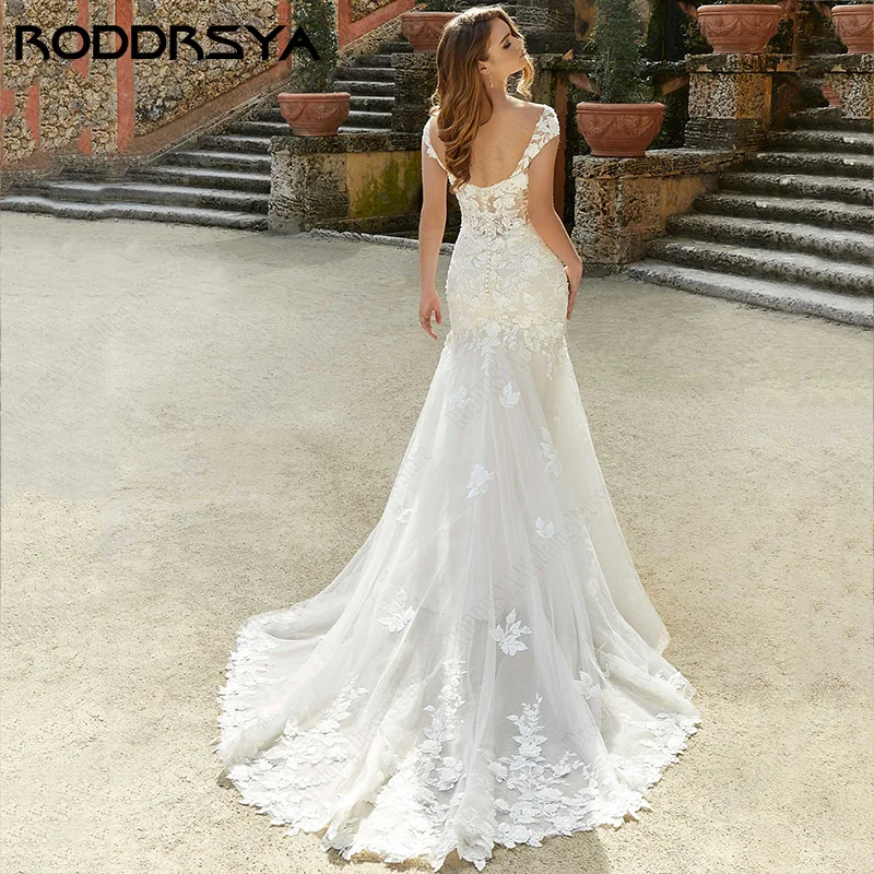 RODDRSYA-vestidos de novia de sirena con cuello redondo de encaje, Mangas de casquillo, vestido de novia de playa de marfil, botones sexys, apliques sin espalda, tren de barrido Encaje gran cuello redondo sirena sombre