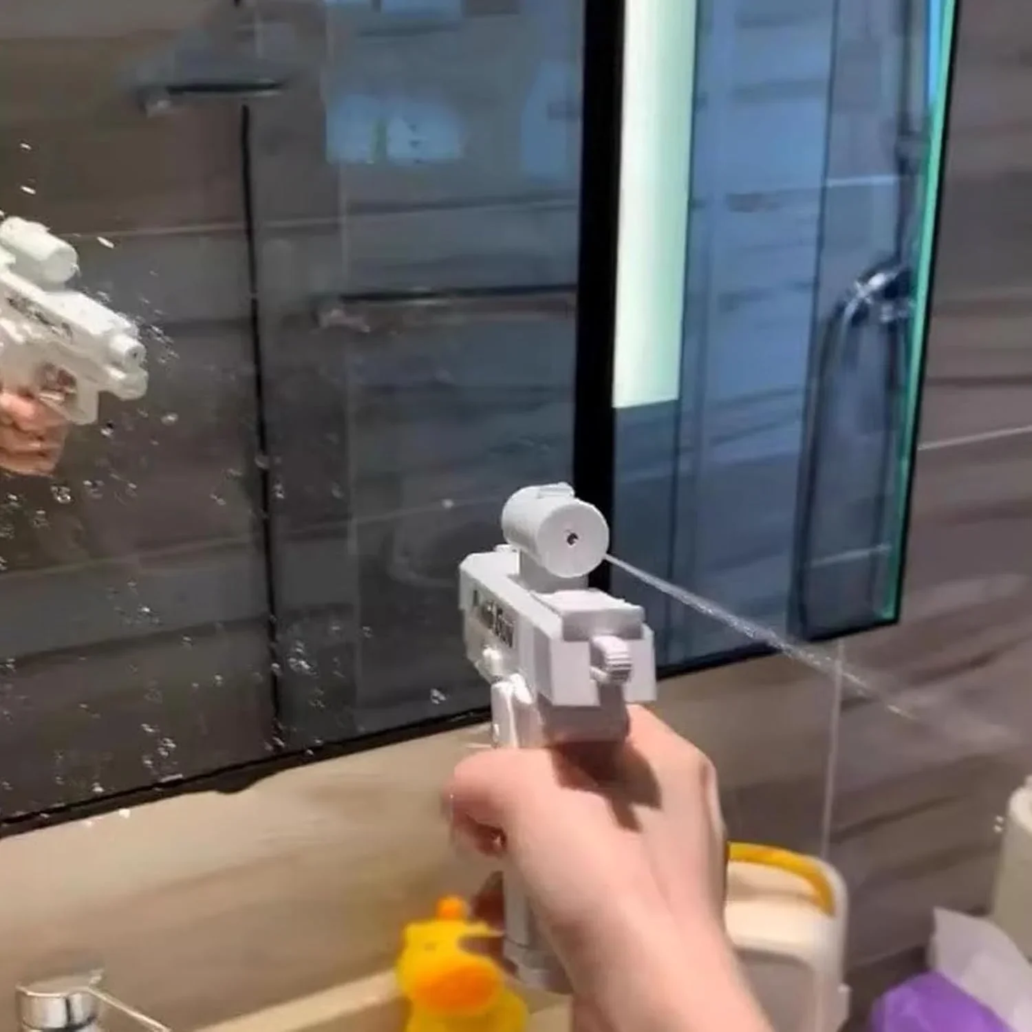 Handheld Handleiding Waterpistool Prank Tweerichtingsspray Watergun Speelgoed Zomer Outdoor Strand Zwembad Waterpistool Speelgoed voor kinderen