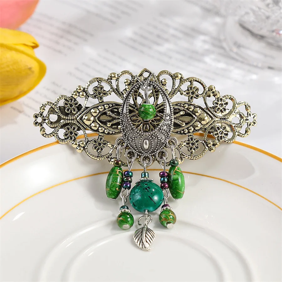 

Brand new bohemian spring clip women's retro metal tassel beaded hollow ponytail clip fashionable literary style hair accessory