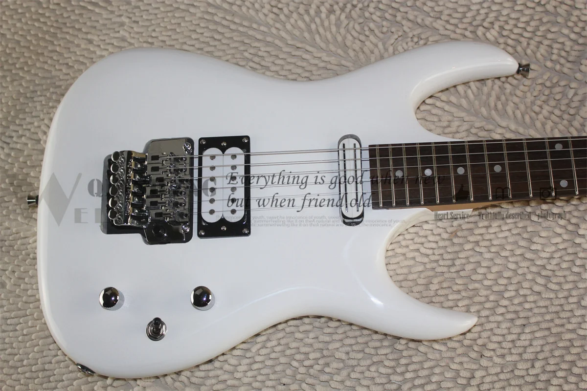 white electric guitar, gs guitar, tremolo bridge, two-track pickups, rosewood fretboard,basswood body