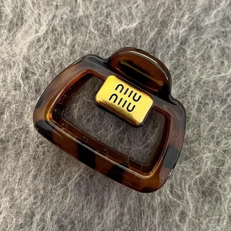 مشبك شعر صغير راقي نمط جديد مشبك شعر نسائي الجزء الخلفي من الرأس مشبك شعر بسيط نصف مربوط على شكل قرش