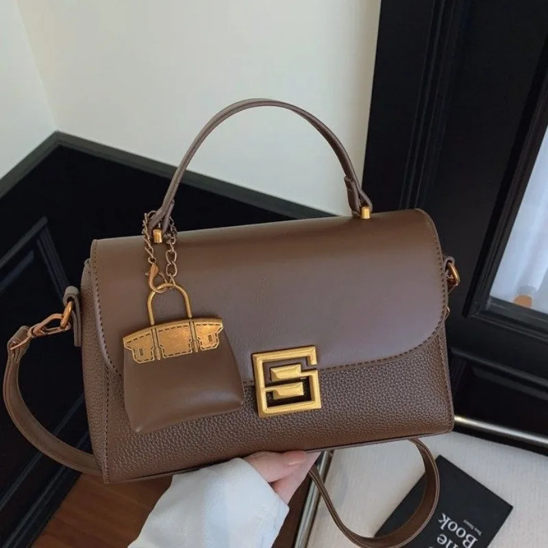 

Минималистичная уникальная сумка для мам, стильная винтажная модная кожаная сумка-тоут для женщин, роскошная и практичная.