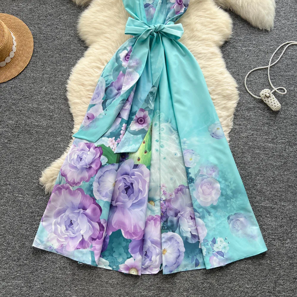 Clothlandผู้หญิงElegant Floralพิมพ์Camiชุดสปาเก็ตตี้สายรัดBackless Sashes Retro MidiชุดMujer QE127