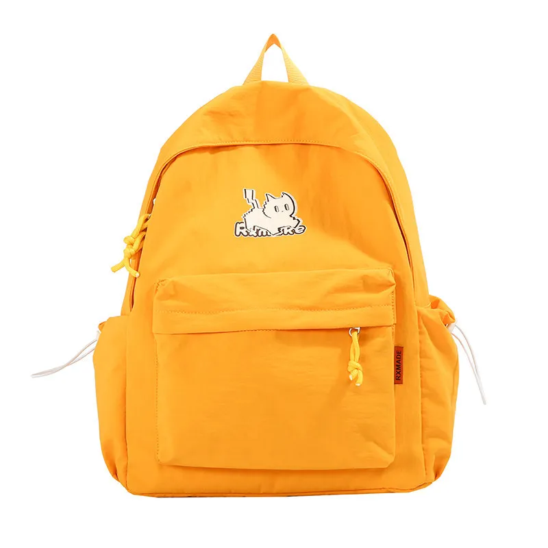 Simple and stylish cartoon backpack with cartoon cat design, lightweight and large-capacity student backpack for campus use