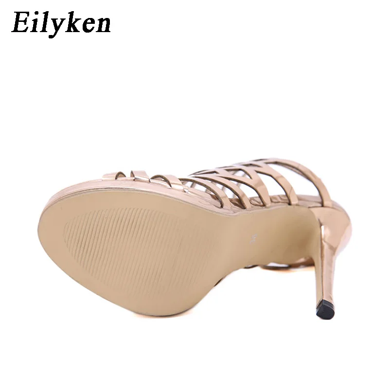 Eilyken Design Golden Open Toe Thin Heels Women Sandals Designer Narrow Band Buckle Strap Gladiator Ladies Shoes Zapatos Mujer