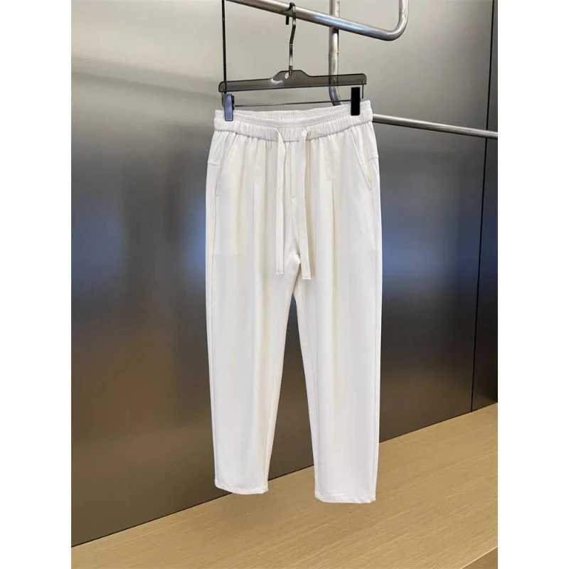 Pantalones rectos de traje sueltos para hombres, cintura elástica, bolsillo con cordón, tendencia versátil, moda informal, verano, sólido, seda de hielo