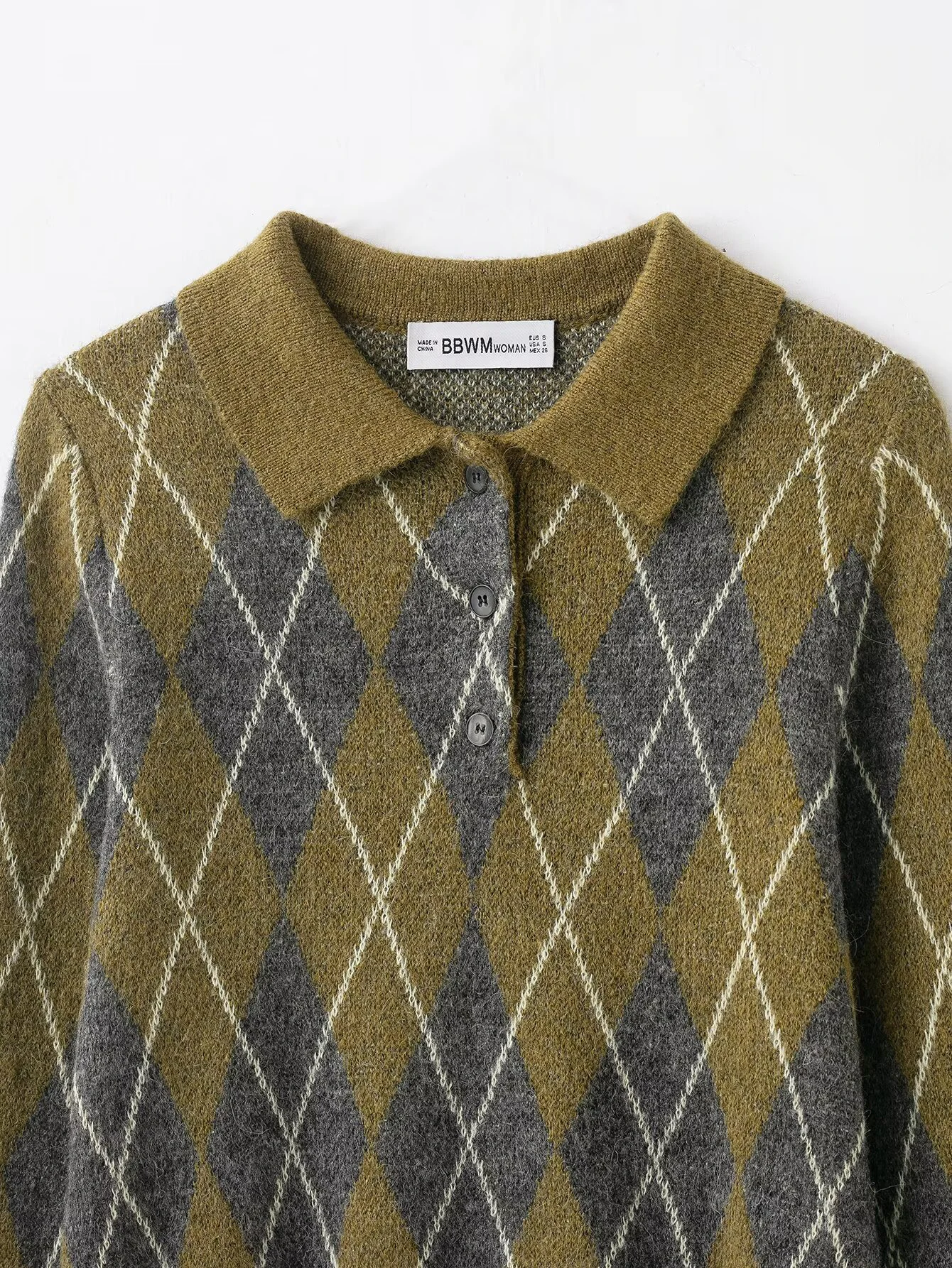 Nuovo abbigliamento invernale da donna in stile europeo e americano, temperamento casual, semplice polo in maglia di diamanti a maniche lunghe