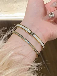 Braccialetti di marca di lusso impermeabili dell'acciaio inossidabile di colore dell'oro di progettazione di lusso per il regalo delle donne