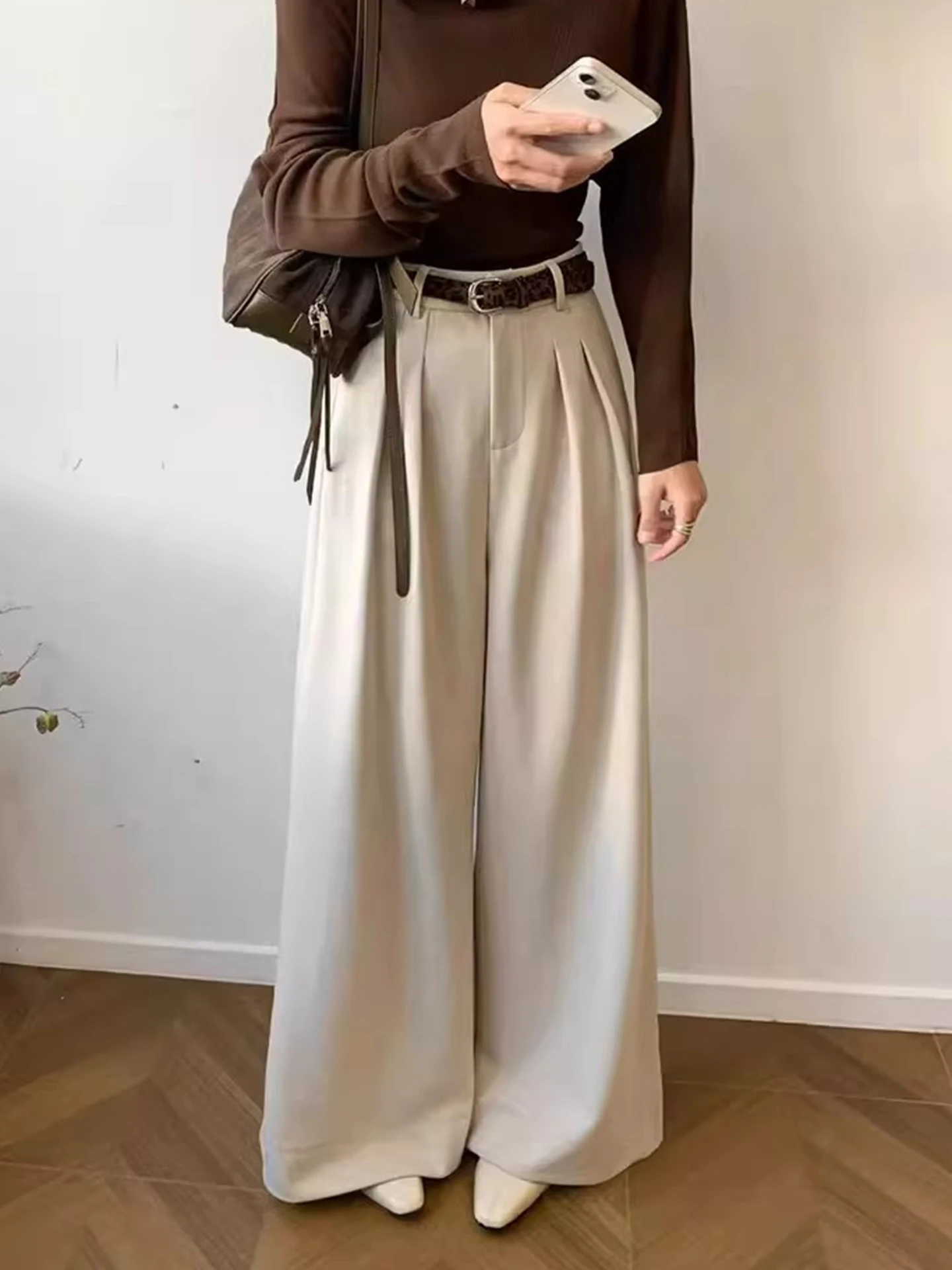 กางเกงสูทเอวสูงผ้าวูลสไตล์เรโทรสำหรับผู้หญิง รุ่นใหม่ต้นฤดูใบไม้ผลิ ทรงหลวม ใส่ได้หลายโอกาส ขากว้าง สไตล์ลำลอง เหมาะสำหรับใส่ไปทำงาน