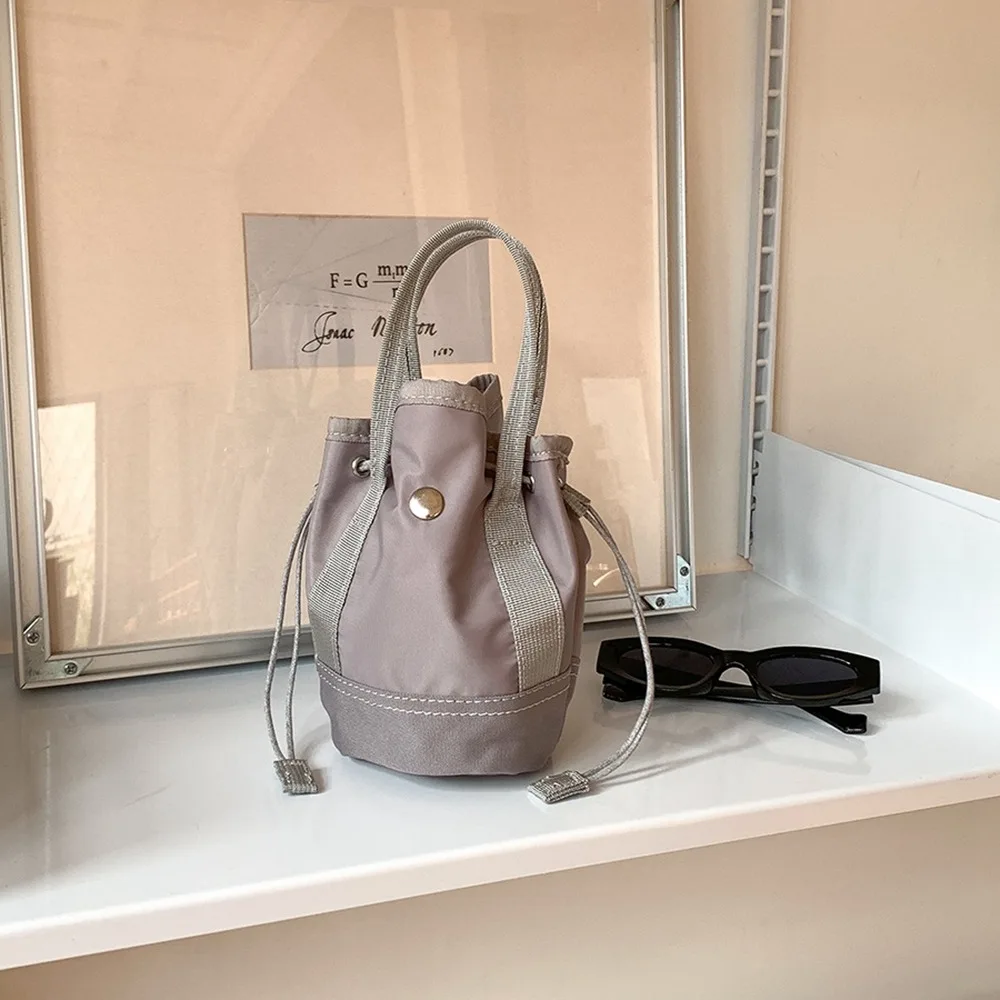 

Korean Style Drawstring Bucket Bag Purse Solid Color Folded Nylon Shoulder Bag Mobile Phone Bag Handbag Vegetable Basket Bag