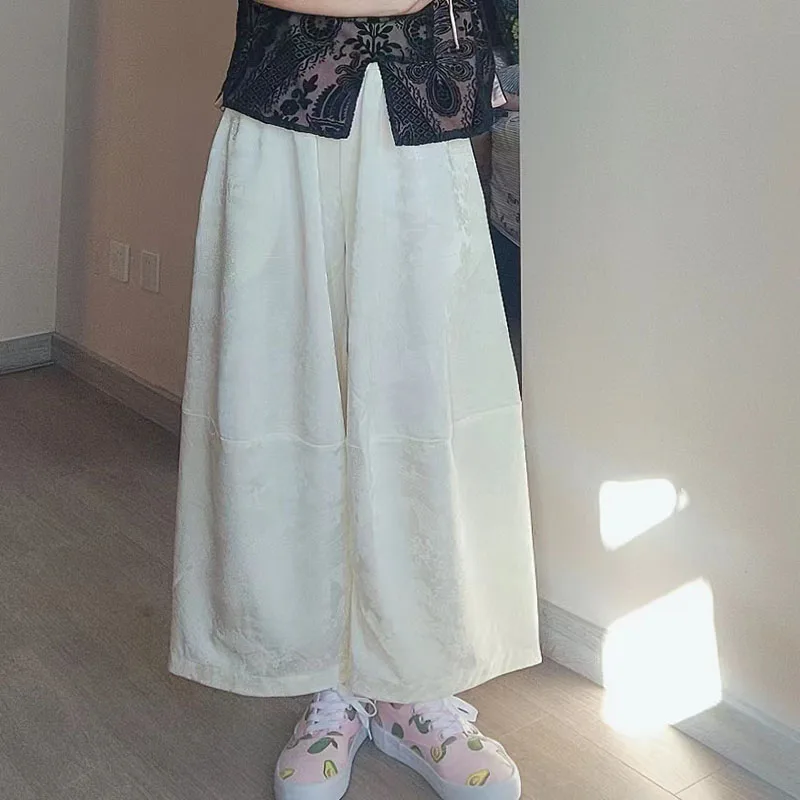 

Новые китайские повседневные брюки-юбка с эластичным поясом, широкими штанинами и длиной до щиколотки, свободного кроя, с цветочным узором...