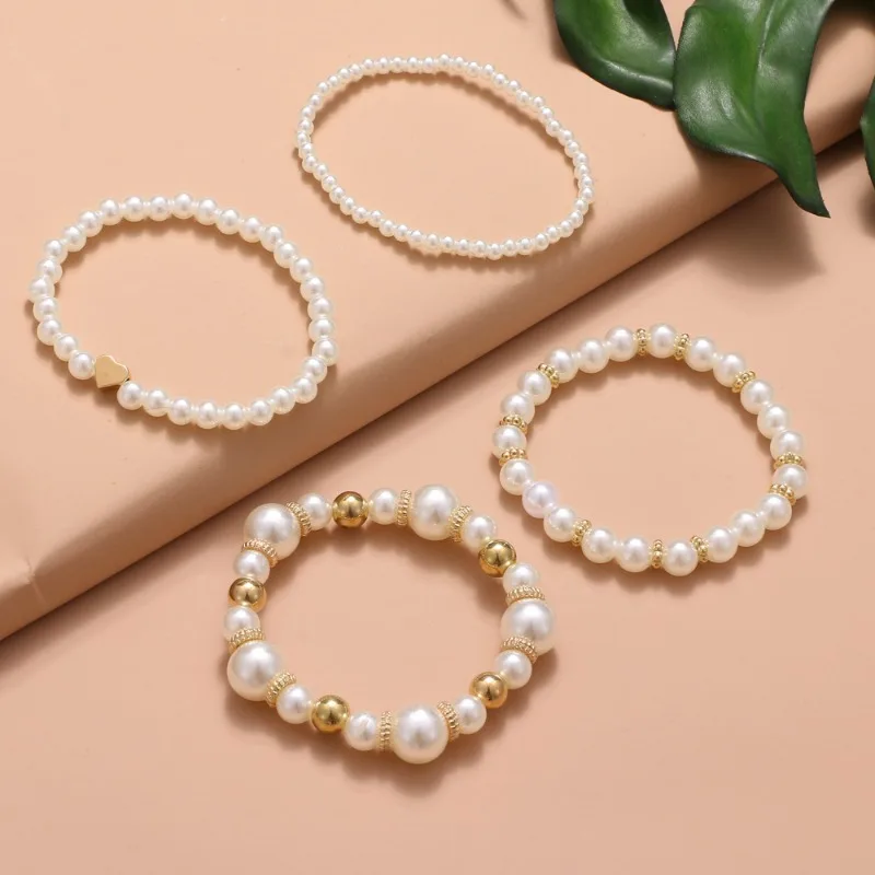 Hermoso y versátil juego de pulseras de perlas Love para mujer, alta calidad, joyería elegante y de moda, 4 Ins