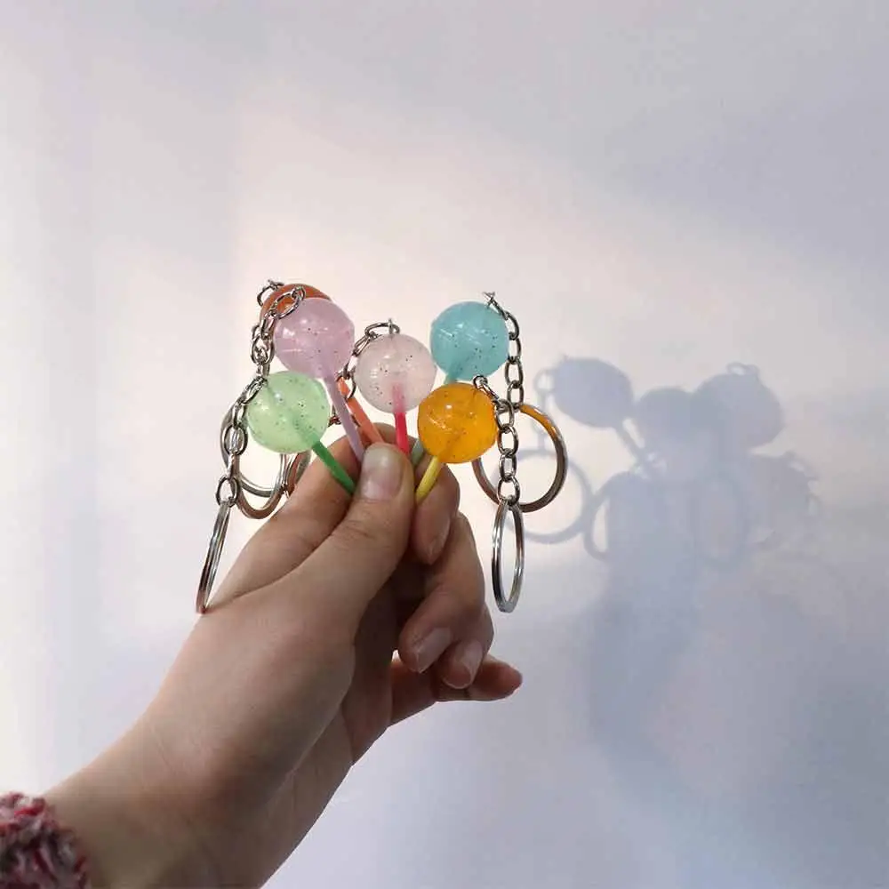 Niedlicher 3D-Lebensmittel-Lollipop-Schlüsselanhänger, Geleefarbener Transparenter Simulations-Lollipop, Mini-Harz-Bonbon-Schlüsselanhänger für Männer und Frauen – Detail 5