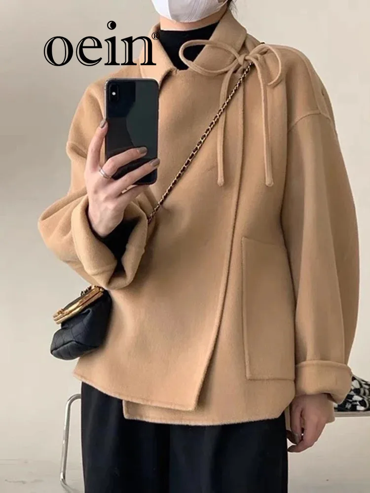 

[oein] South Korea Dongdaemun Autumn New Collection Solid Color Versatile Temperament Collar Strap Design Loose Long Sleeve Coat