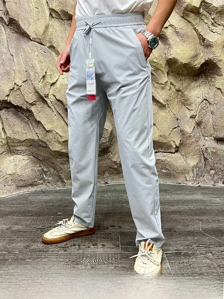 Quick Dry Elastic Outdoor Casual Pants Men's Spring Summer Laser Carved Three-Proof Black Tech Breathable Straight Leg Trousers
