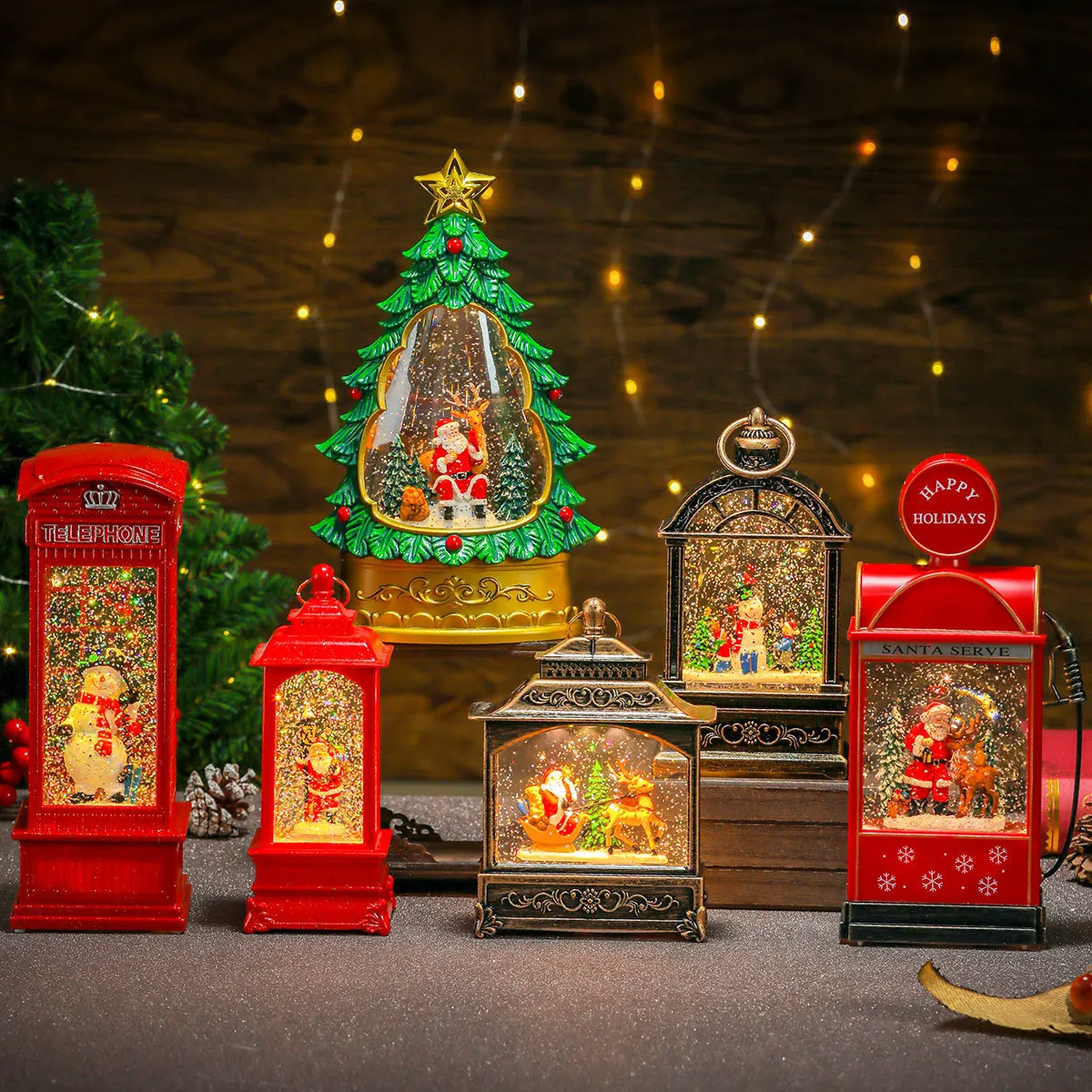 Multiple water filled illuminated music ornaments, telephone booths, oil lamps, wind lamps, Christmas decorations, Christmas