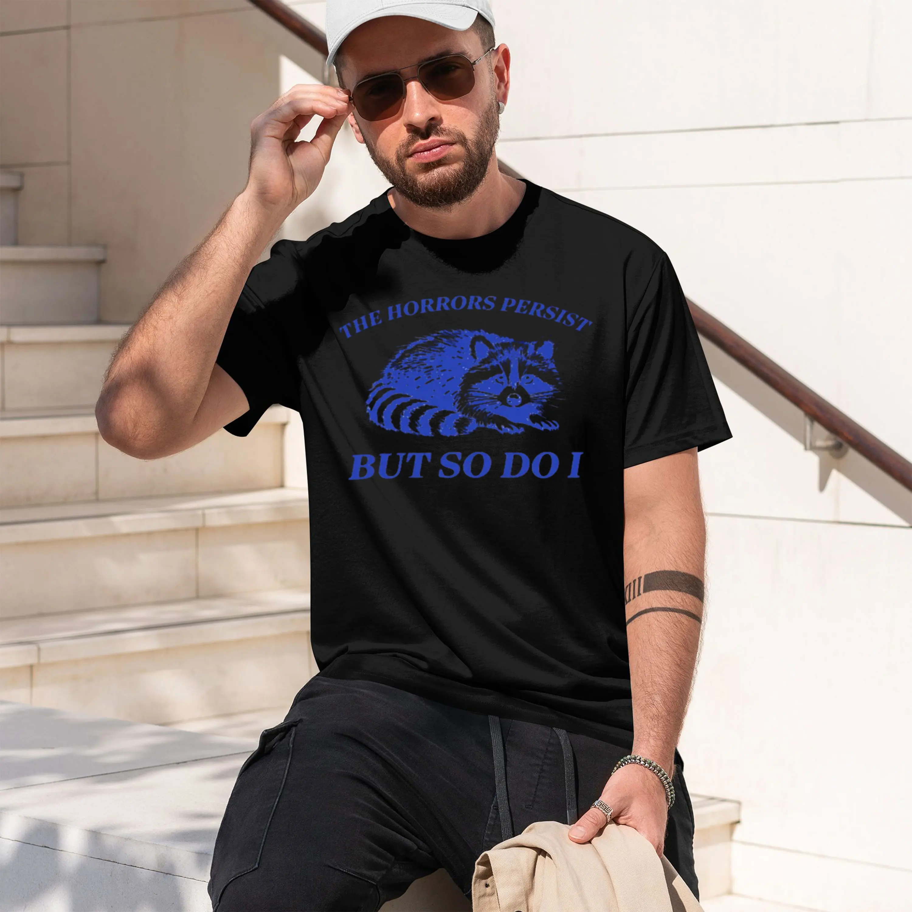 The Horrors Persist But So I T-Shirt Men Women Funny Raccoon T Shirt Vintage Y2K Animal Humor Tshirt Short Sve Tee 2026 New Mode